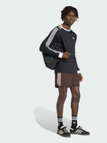 Повсякденні шорти Adidas Adicolor модель KE1662 Повсякденні шорти Adidas Adicolor модель KE1662 Фото