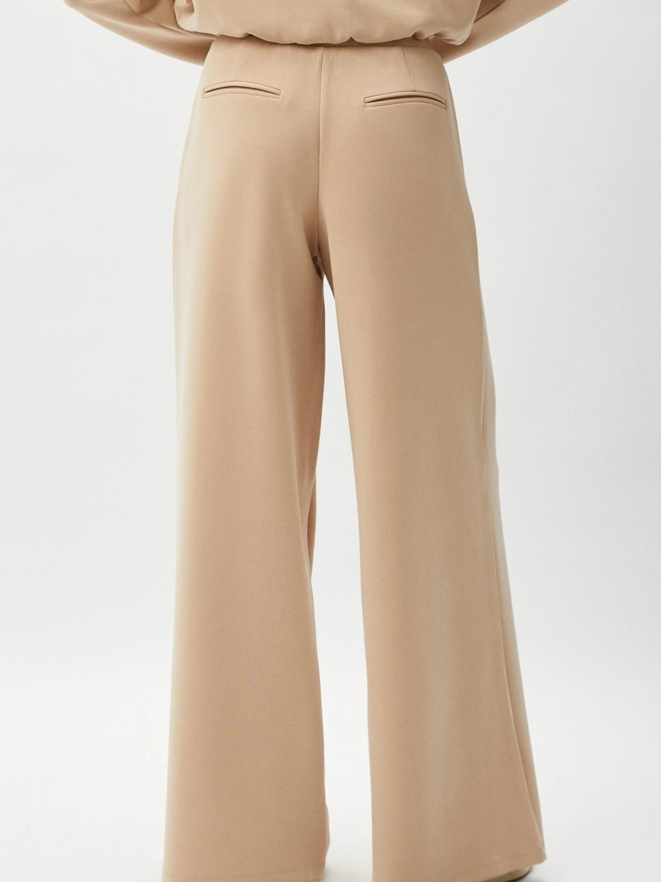 Жіночі бежеві спортивні штани модель V4YB07.KCAY2;G1L9 Жіночі бежеві спортивні штани модель V4YB07.KCAY2;G1L9 Фото