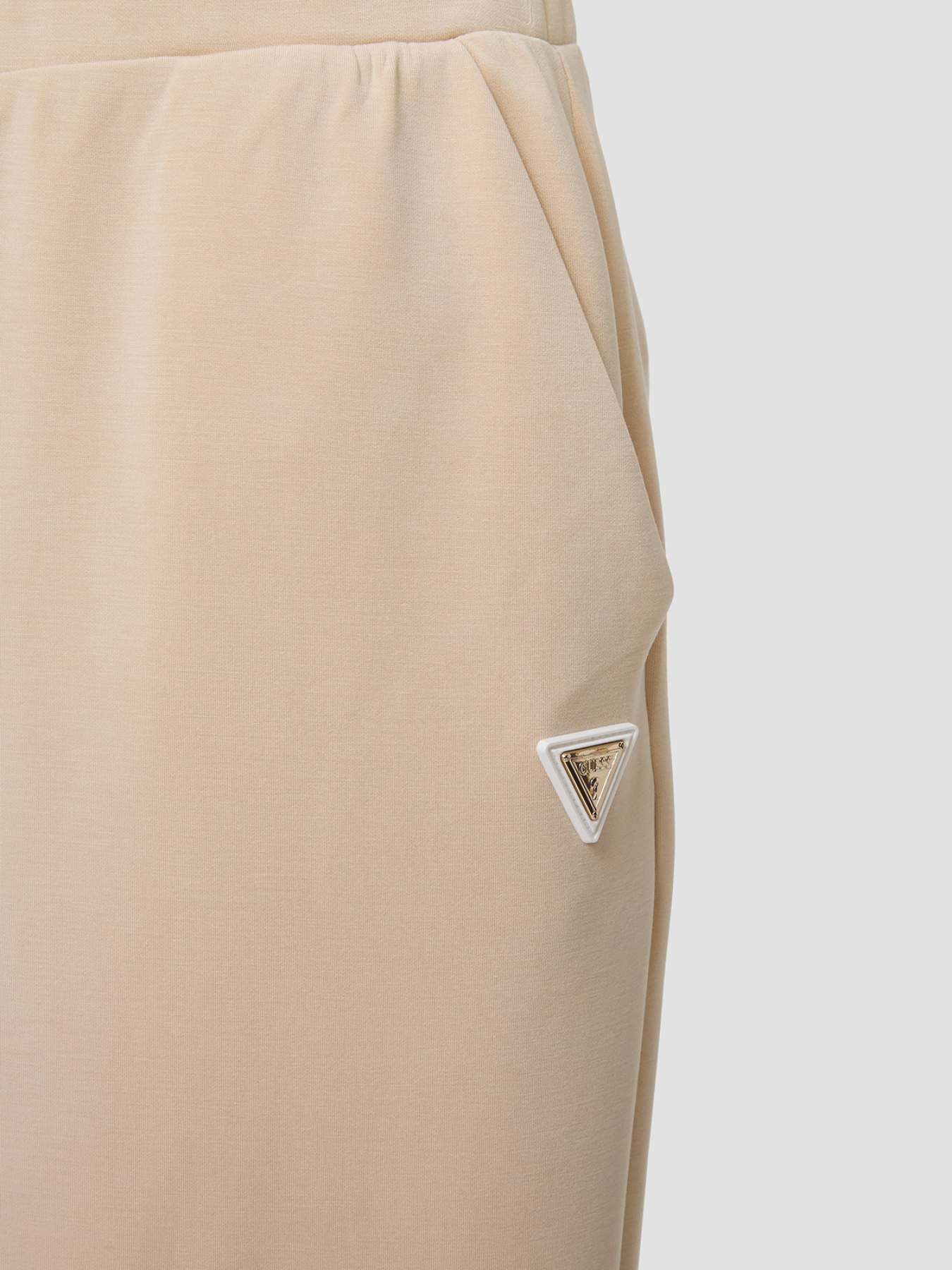 Жіночі бежеві спортивні штани модель V4YB07.KCAY2;G1L9 Жіночі бежеві спортивні штани модель V4YB07.KCAY2;G1L9 Фото