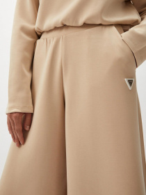 Жіночі бежеві спортивні штани модель V4YB07.KCAY2;G1L9 Жіночі бежеві спортивні штани модель V4YB07.KCAY2;G1L9 Фото