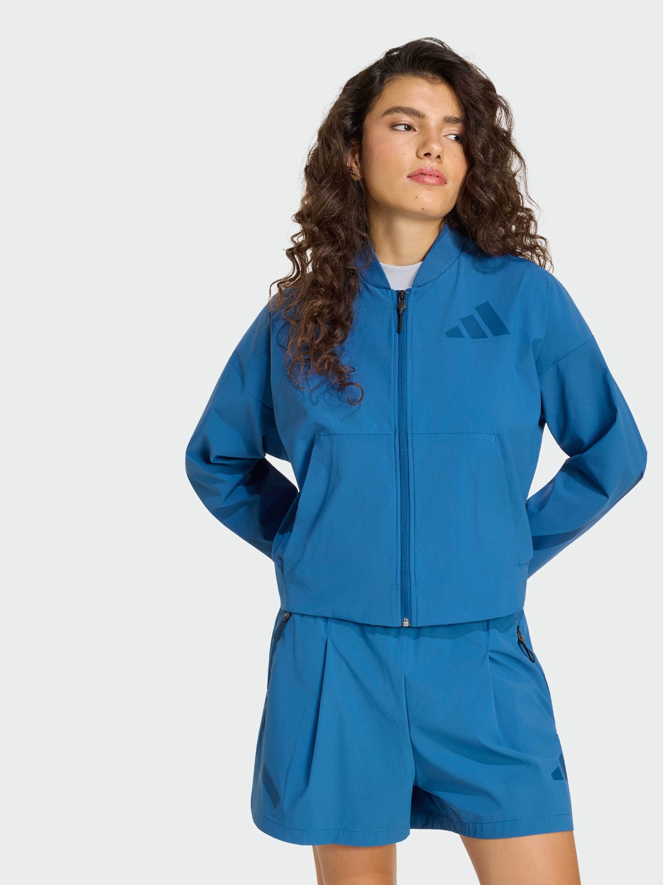 Жіночий Бомбер adidas ZNE (KF1822) колір синій, матеріал комбінований верх