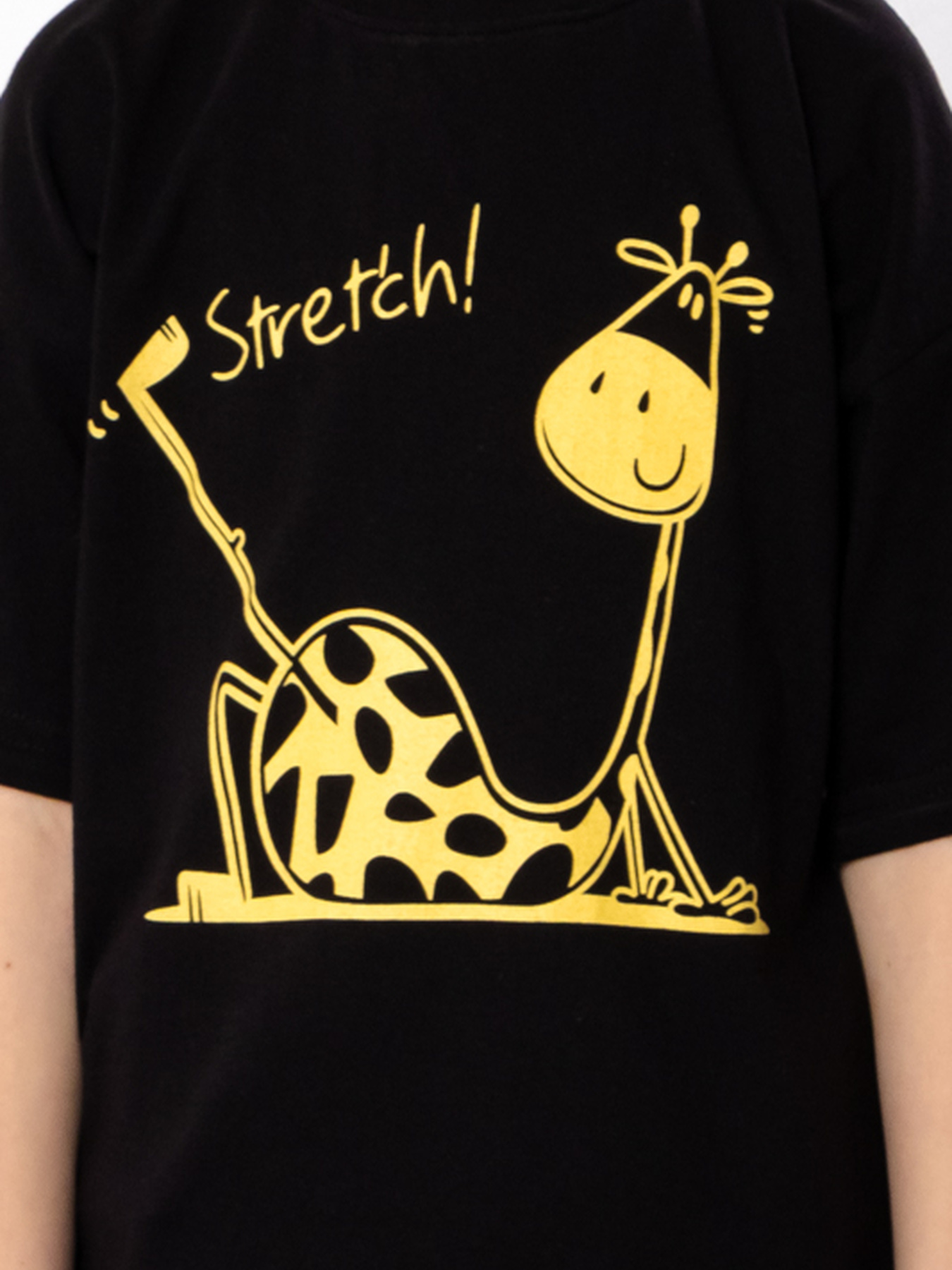 Футболка для дівчинки з принтом жирафа та написом Stretch, Чорний Носи Своє (6414-001-33-5-4) модель 6414-001-33-5-4-chornij-zhirafa Фото