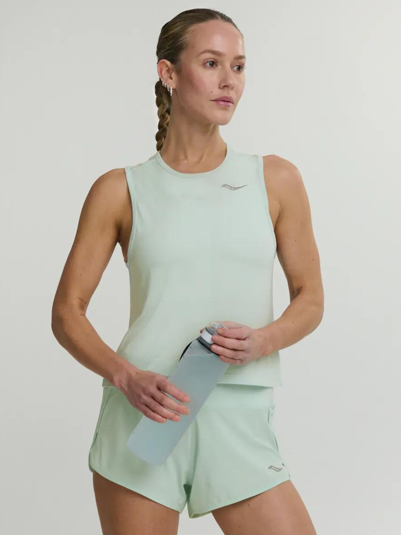 Женская майка Saucony STOPWATCH CROP TANK модель SAW800527-AQH Фото