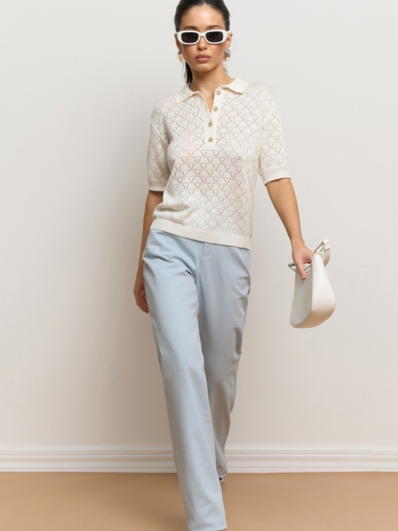 Жіноче ажурне поло з коротким рукавом, Молочний TrikoBakh (2919) модель 2919-molochnij Фото