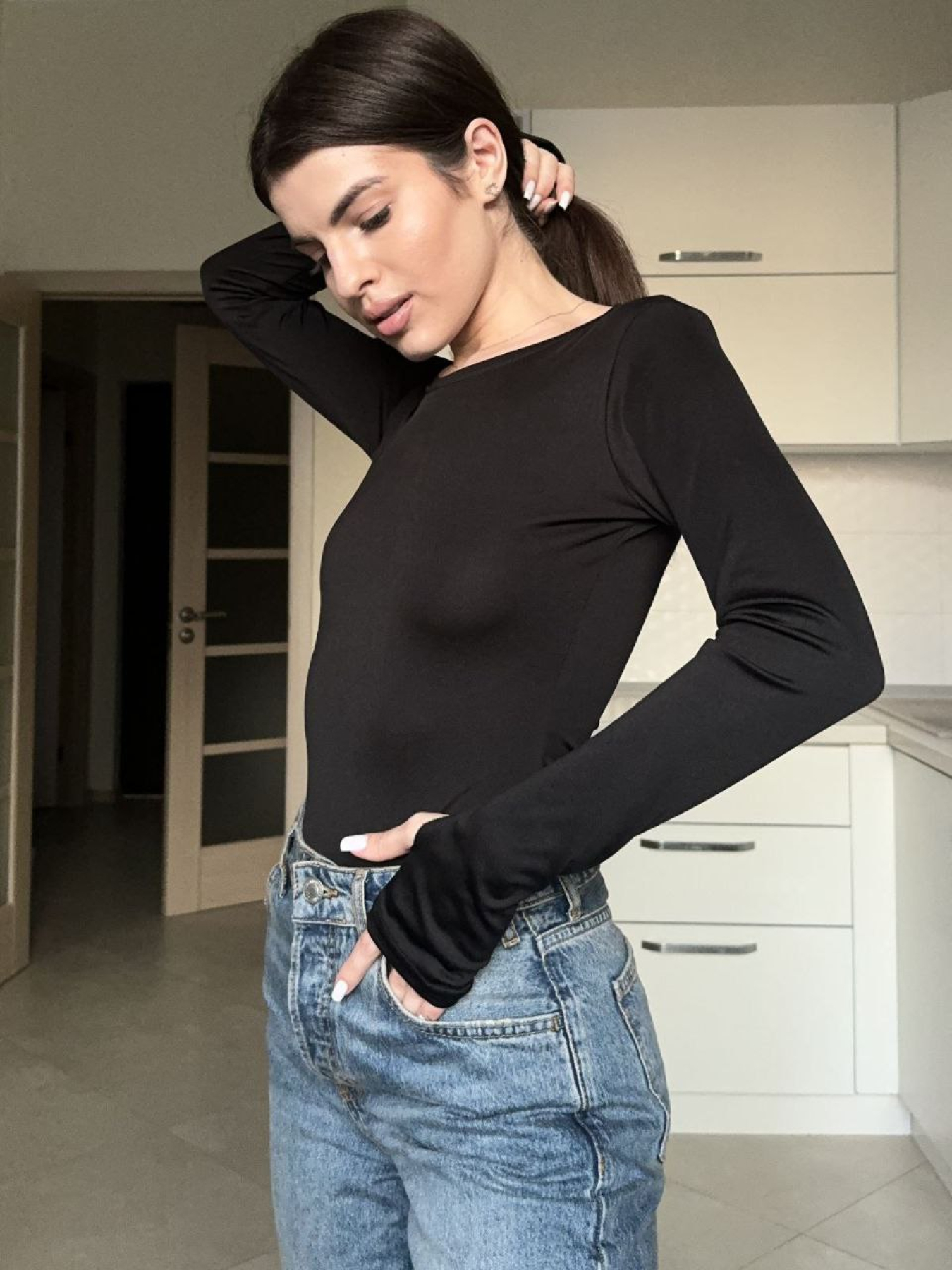 Жіночий базовий однотонний боді з рукавом, Чорний Uaclothes (like15954) модель like15954-chernj Фото