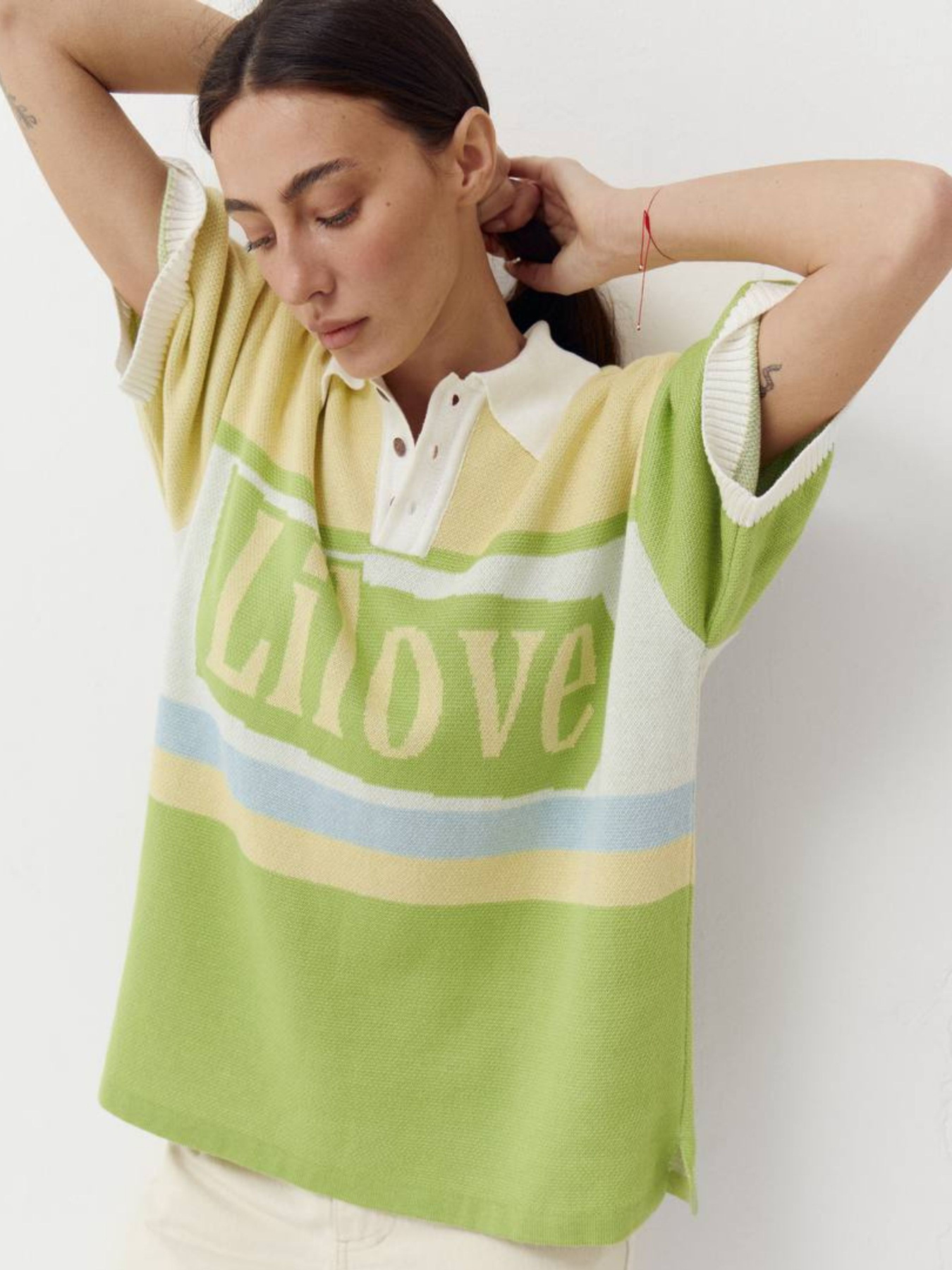 Желтая женская футболка поло из трикотажа Jacquard mood модель 418 Желтая женская футболка поло из трикотажа Jacquard mood модель 418 Фото