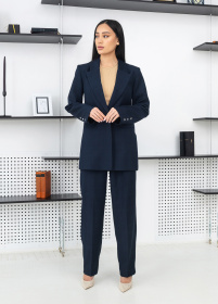 Костюмы Костюм женский классический в клетку на кнопках модель Su4004 Фото