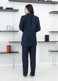 Костюмы Костюм женский классический в клетку на кнопках модель Su4004 Фото